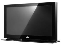 Reklamą w prasie lub telewizji